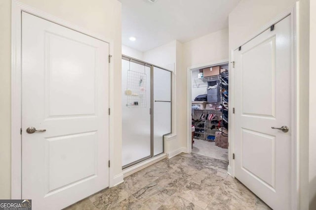 306 Cherokee Station Cir, Woodstock, GA 30188 - full bath featuring a shower stall and a walk in closet