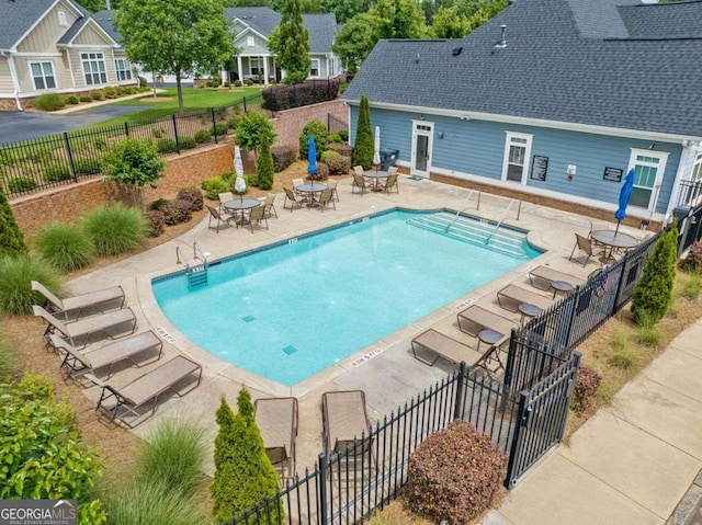 306 Cherokee Station Cir, Woodstock, GA 30188 - community pool featuring a patio