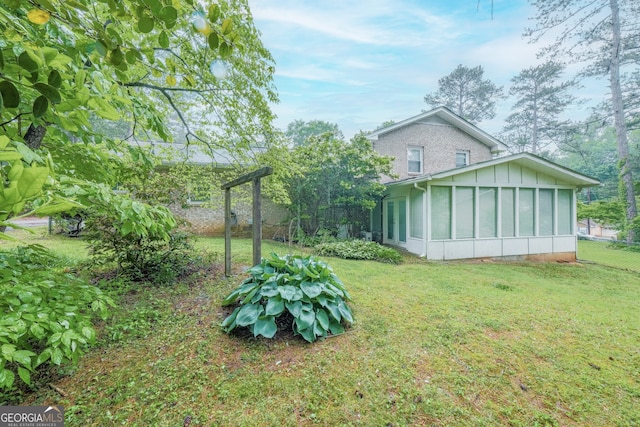 4244 Dorsey Ct SW, Lilburn, GA 30047 - view of yard with a sunroom