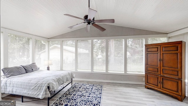 4244 Dorsey Ct SW, Lilburn, GA 30047 - bedroom with vaulted ceiling, light wood-style flooring, and a ceiling fan
