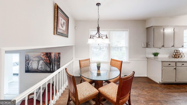 4244 Dorsey Ct SW, Lilburn, GA 30047 - dining space with dark wood finished floors and baseboards
