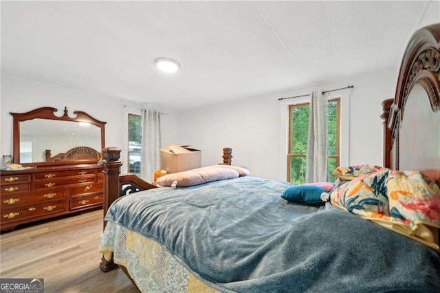 bedroom with wood finished floors