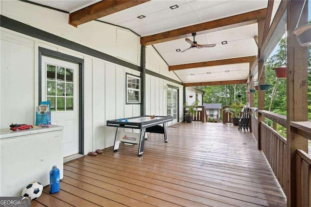 wooden terrace with ceiling fan and french doors