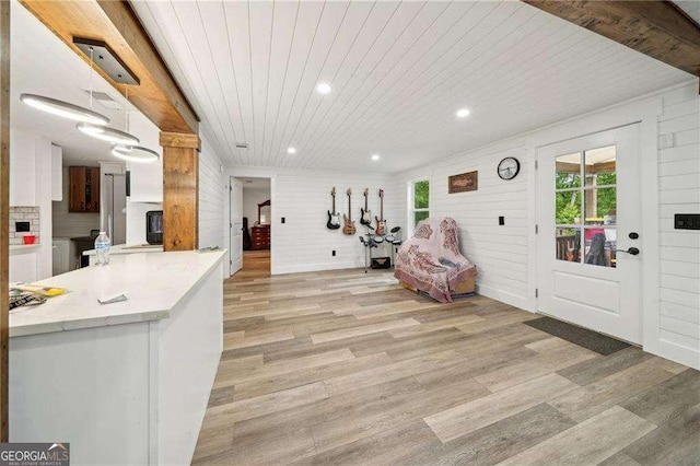 kitchen with wood ceiling, light wood-style flooring, white cabinetry, light countertops, and recessed lighting