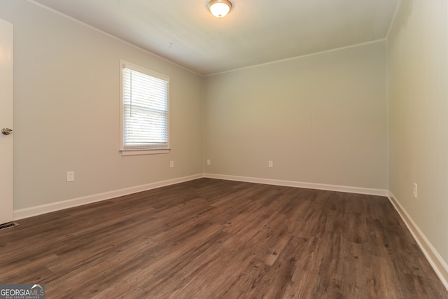 5243 Valleyview Dr, Acworth, GA 30102 - empty room with dark wood-style floors and ornamental molding