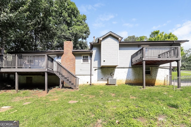 5243 Valleyview Dr, Acworth, GA 30102 - rear view of house with a deck and a chimney