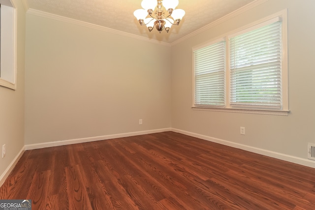 5243 Valleyview Dr, Acworth, GA 30102 - empty room with a chandelier, dark wood-style flooring, and crown molding