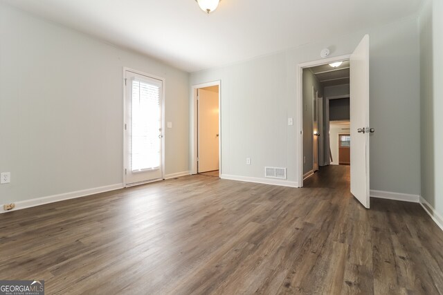 5243 Valleyview Dr, Acworth, GA 30102 - empty room with dark wood-type flooring and baseboards