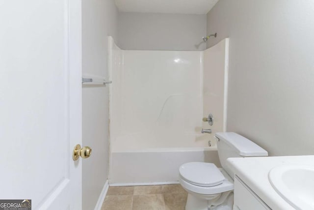 7623 Mcgillicuty Dr, Union City, GA 30291 - full bath with vanity, toilet, shower / tub combination, tile patterned floors, and baseboards