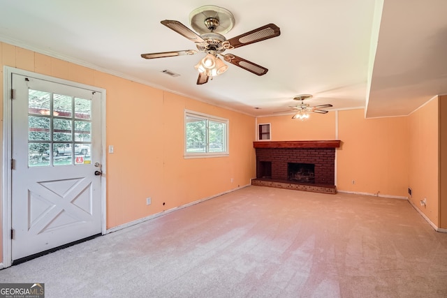 5401 Smoke Rise Dr, Smoke Rise, GA 30087 - unfurnished living room with crown molding, a ceiling fan, light colored carpet, a brick fireplace, and baseboards