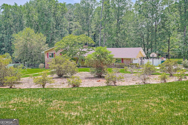 5401 Smoke Rise Dr, Smoke Rise, GA 30087 - view of property exterior featuring a lawn