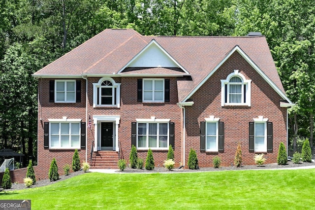 20 Allie Dr, Mcdonough, GA 30252 - colonial inspired home featuring a front yard and brick siding
