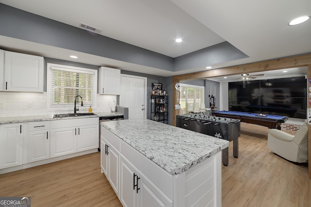 20 Allie Dr, Mcdonough, GA 30252 - kitchen with a sink, pool table, light wood finished floors, backsplash, and stainless steel dishwasher