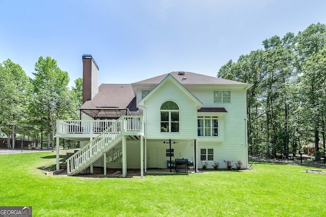20 Allie Dr, Mcdonough, GA 30252 - back of property with a deck, stairway, a chimney, a patio area, and a ceiling fan