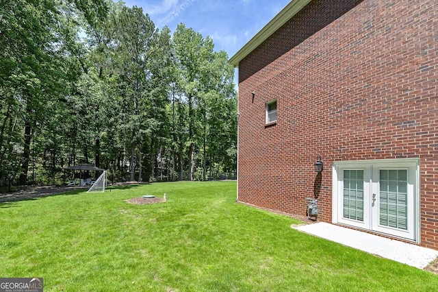 20 Allie Dr, Mcdonough, GA 30252 - view of green lawn with french doors and a gazebo