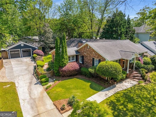1041 Standard Dr, Brookhaven, GA 30319 - ranch-style house with a garage, concrete driveway, and brick siding