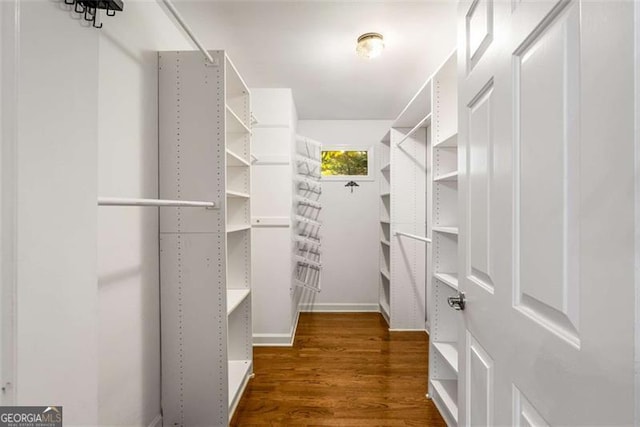 1041 Standard Dr, Brookhaven, GA 30319 - spacious closet featuring wood finished floors