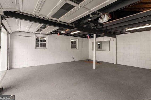 1041 Standard Dr, Brookhaven, GA 30319 - garage with a garage door opener and concrete block wall
