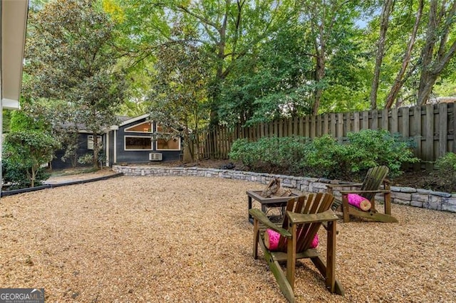 1041 Standard Dr, Brookhaven, GA 30319 - view of yard featuring an outdoor fire pit and fence