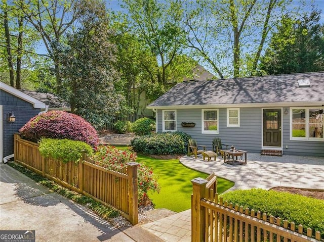1041 Standard Dr, Brookhaven, GA 30319 - view of yard with a patio and fence