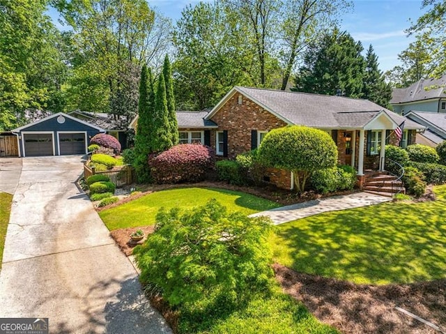 1041 Standard Dr, Brookhaven, GA 30319 - single story home featuring brick siding, driveway, and an attached garage