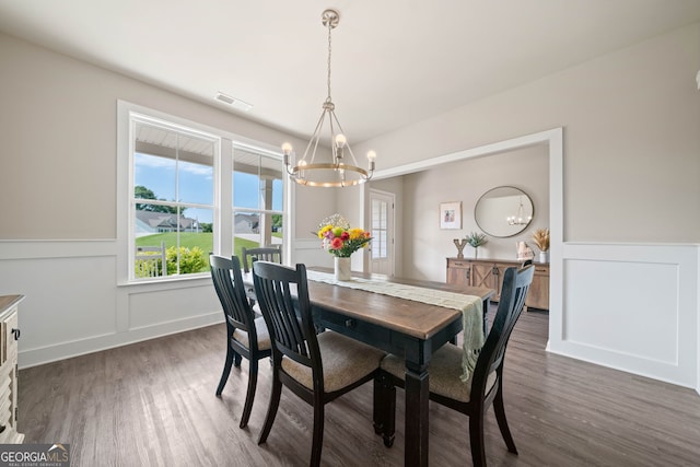 433 Crystal Way, Cornelia, GA 30531 - dining room featuring a chandelier, dark wood-style floors, a decorative wall, and a wainscoted wall