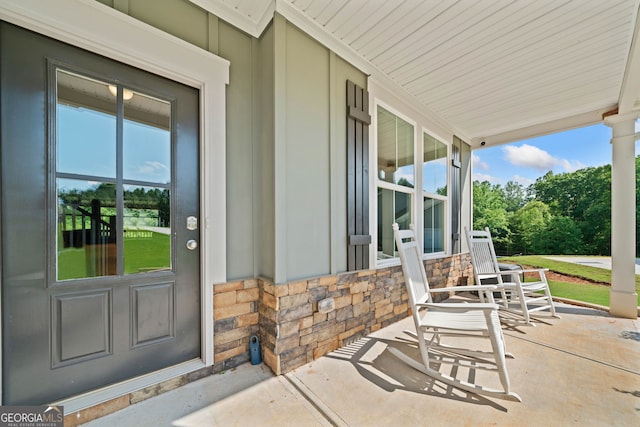 433 Crystal Way, Cornelia, GA 30531 - doorway to property with covered porch and stone siding