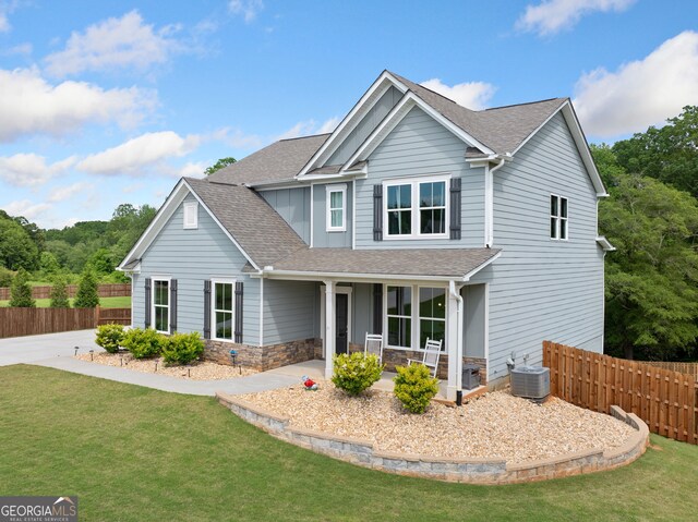 433 Crystal Way, Cornelia, GA 30531 - view of front of house featuring a shingled roof, central AC unit, and stone siding