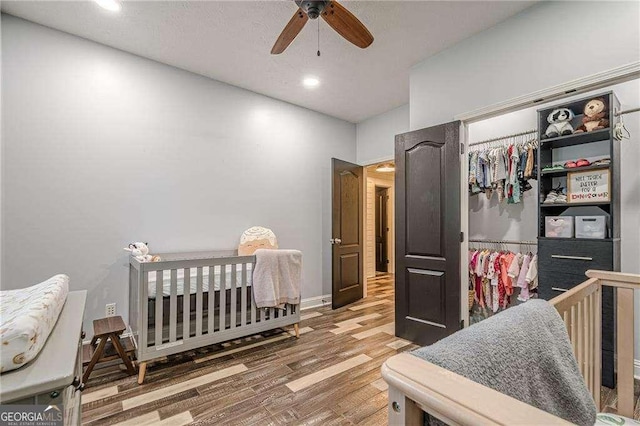 188 Cooper Creek Dr, Dallas, GA 30157 - bedroom featuring wood finished floors, recessed lighting, a ceiling fan, a closet, and baseboards