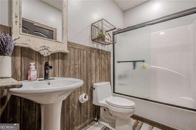 188 Cooper Creek Dr, Dallas, GA 30157 - bathroom with toilet, enclosed tub / shower combo, and wood finished floors