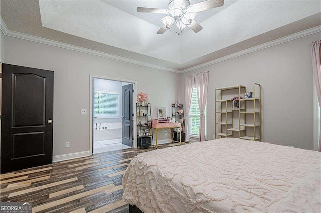 188 Cooper Creek Dr, Dallas, GA 30157 - bedroom with a raised ceiling, wood finished floors, baseboards, ensuite bathroom, and crown molding