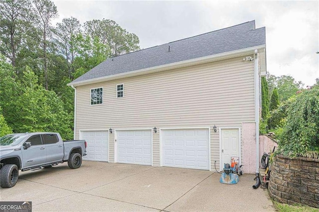 188 Cooper Creek Dr, Dallas, GA 30157 - view of side of property featuring concrete driveway and an attached garage