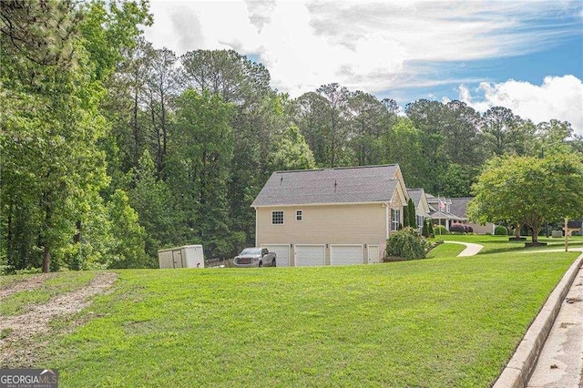 188 Cooper Creek Dr, Dallas, GA 30157 - view of side of property featuring a garage, a shed, a yard, and an outdoor structure