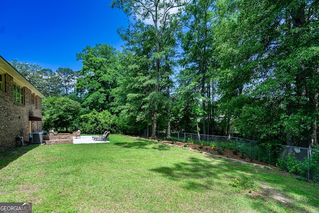 347 Brookridge Dr, Lagrange, GA 30241 - view of yard with central AC and a patio area