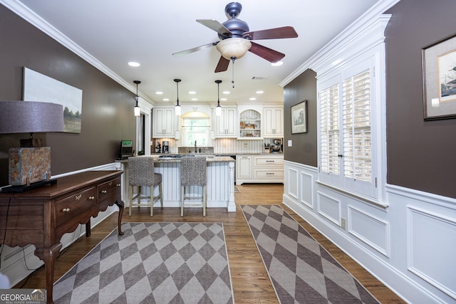 347 Brookridge Dr, Lagrange, GA 30241 - kitchen featuring a sink, ornamental molding, ceiling fan, hanging light fixtures, and open shelves