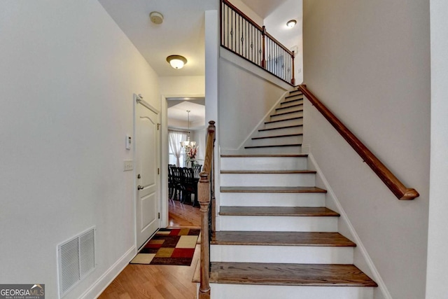 25 Kaktovic Ct, Grayson, GA 30017 - stairs with wood finished floors and baseboards
