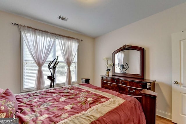 25 Kaktovic Ct, Grayson, GA 30017 - bedroom with light wood-style flooring