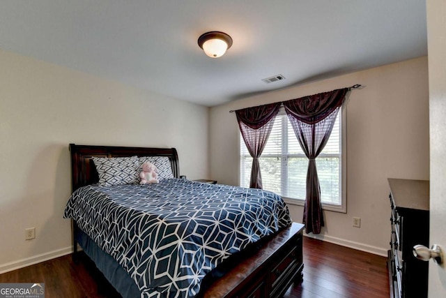 25 Kaktovic Ct, Grayson, GA 30017 - bedroom with dark wood-style floors and baseboards