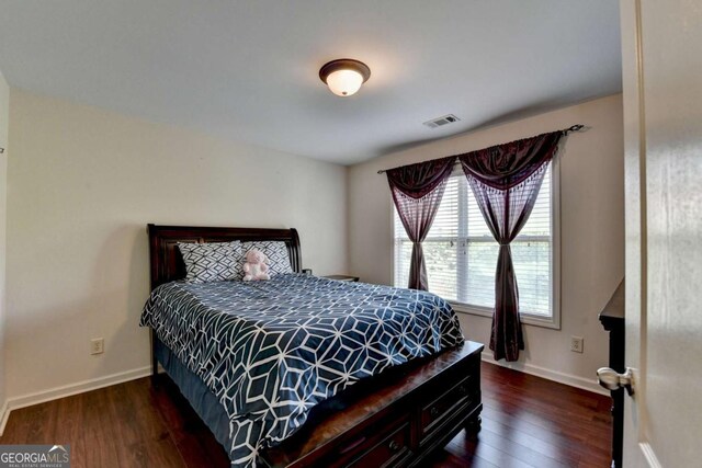 25 Kaktovic Ct, Grayson, GA 30017 - bedroom featuring wood finished floors and baseboards