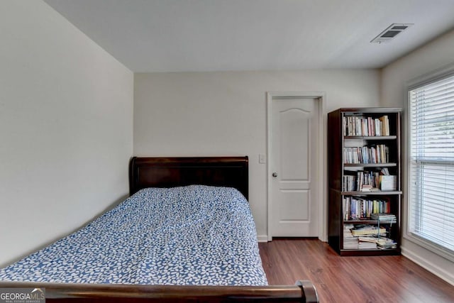 25 Kaktovic Ct, Grayson, GA 30017 - bedroom featuring wood finished floors and baseboards