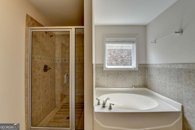 25 Kaktovic Ct, Grayson, GA 30017 - full bath featuring a bath and a stall shower