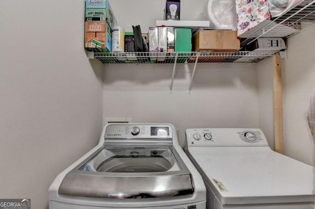 25 Kaktovic Ct, Grayson, GA 30017 - clothes washing area featuring washing machine and dryer