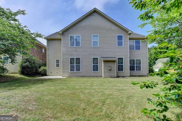25 Kaktovic Ct, Grayson, GA 30017 - rear view of property with a yard