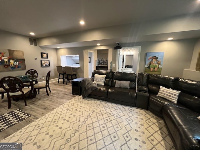 1122 Montclair Dr, Peachtree City, GA 30269 - living area with light wood-type flooring, recessed lighting, and baseboards