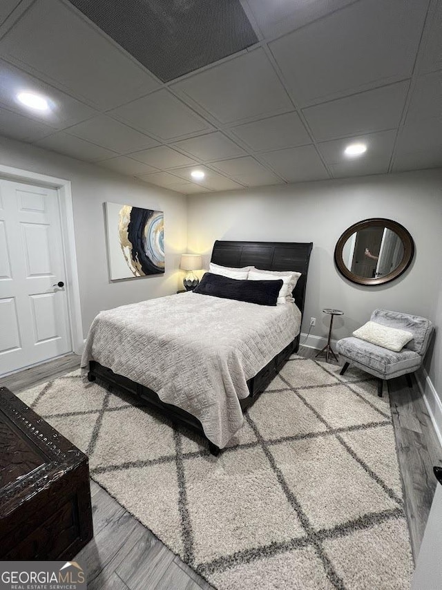 1122 Montclair Dr, Peachtree City, GA 30269 - bedroom with recessed lighting, wood finished floors, and baseboards