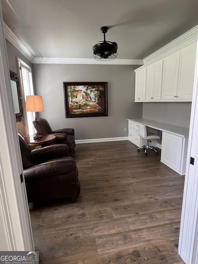 1122 Montclair Dr, Peachtree City, GA 30269 - home office with ornamental molding, built in study area, dark wood-style flooring, and baseboards