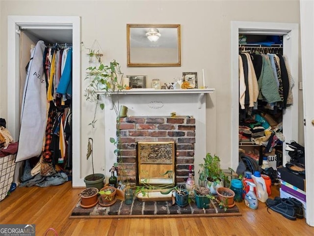 760 Ashland Ave, Atlanta, GA 30307 - detailed view of wood finished floors and a brick fireplace