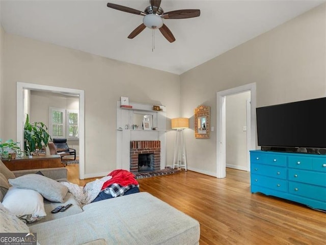 760 Ashland Ave, Atlanta, GA 30307 - living area featuring ceiling fan, wood finished floors, baseboards, and a fireplace