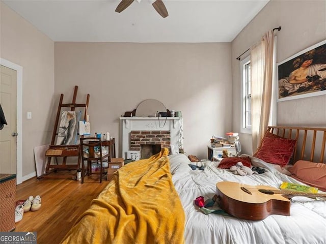760 Ashland Ave, Atlanta, GA 30307 - bedroom with wood finished floors and a fireplace