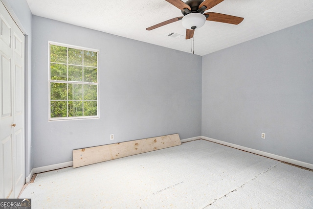 1576 King Mill Rd, Mcdonough, GA 30252 - unfurnished room with baseboards and ceiling fan